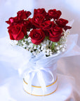 Flower arrangement red roses in white hatbox