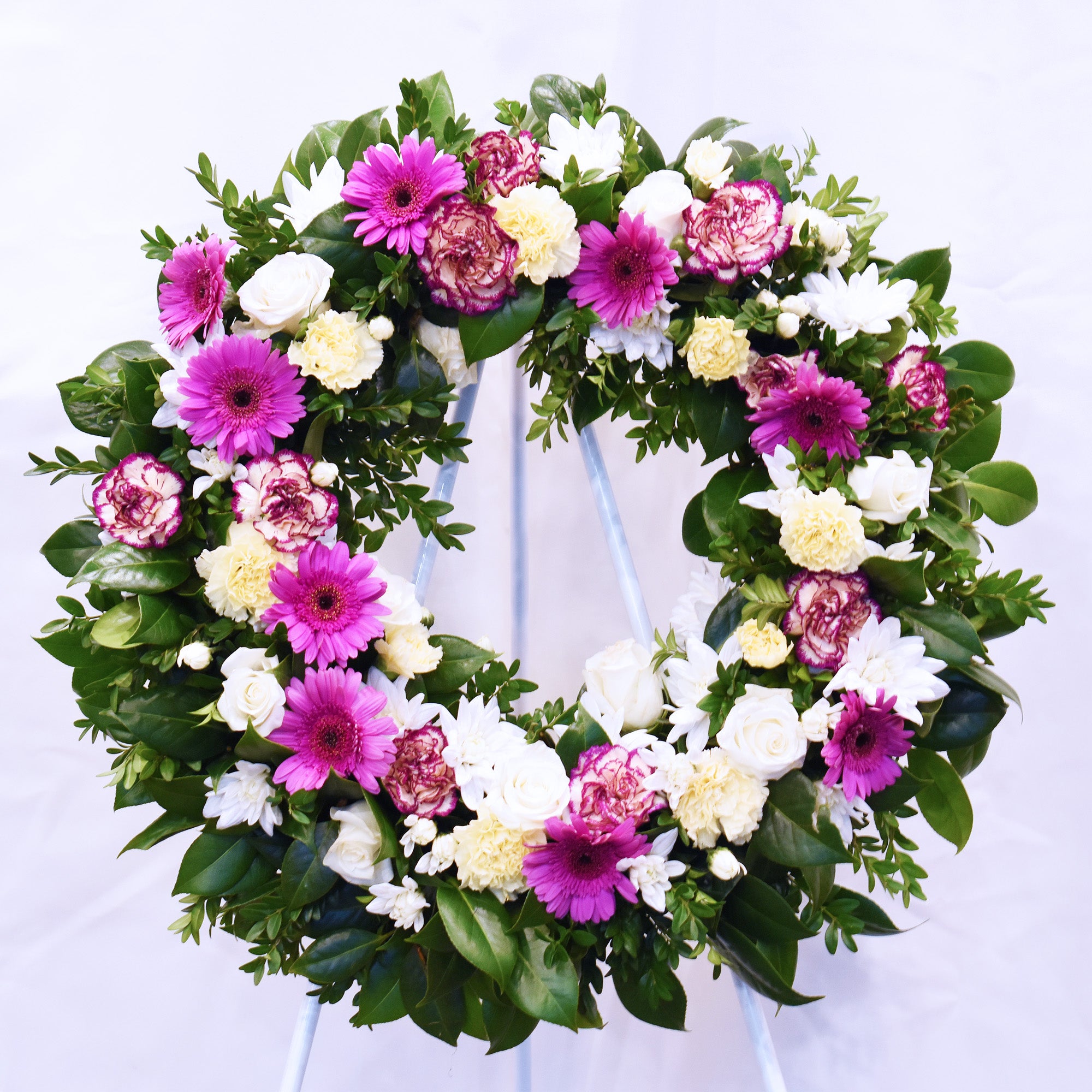 Pretty Pink Funeral Flower Wreath