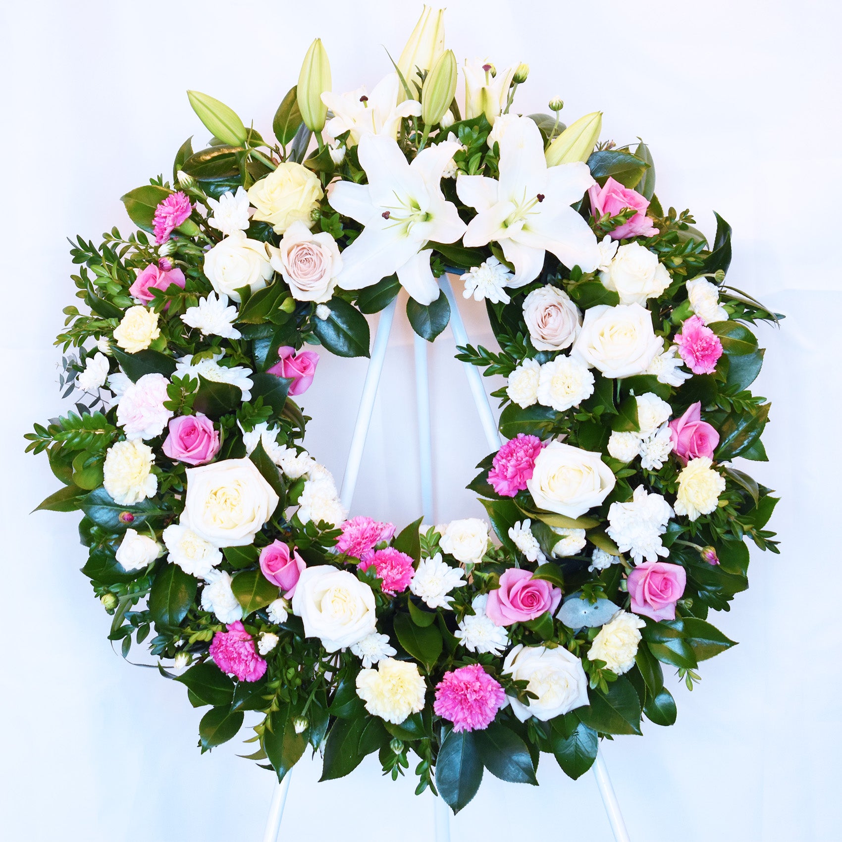 Renewal Lilies Funeral Flower Wreath